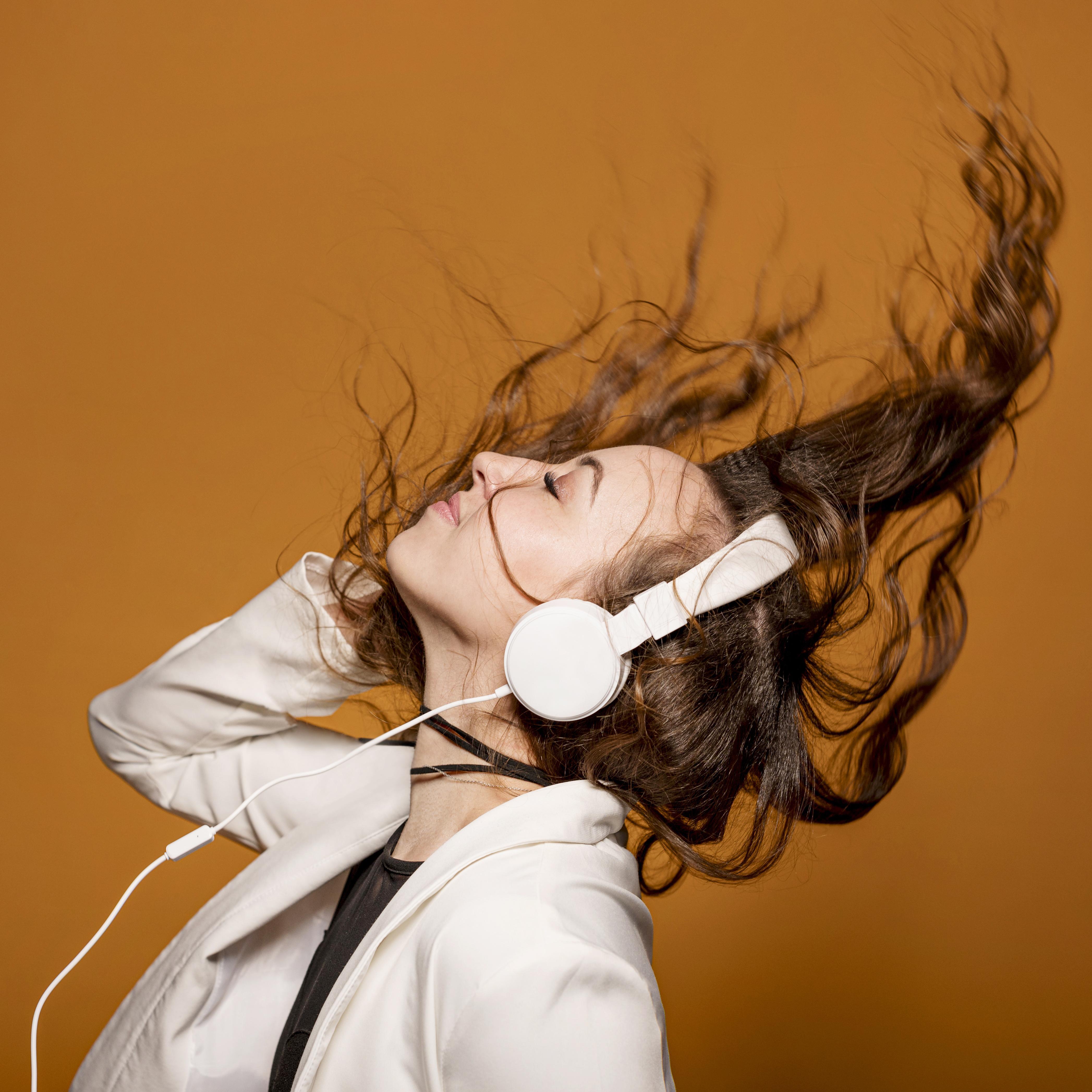 side-view-female-with-headphones